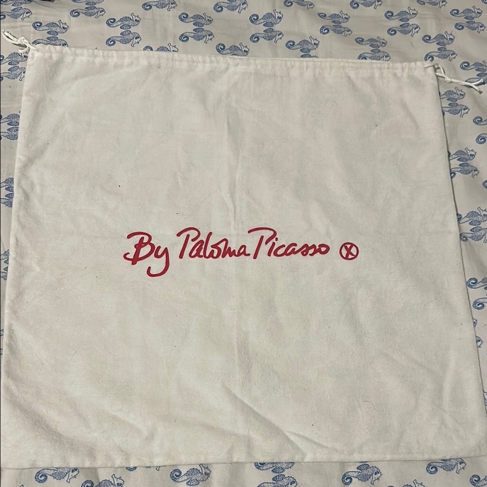 Paloma Picasso White Drawstring Bag